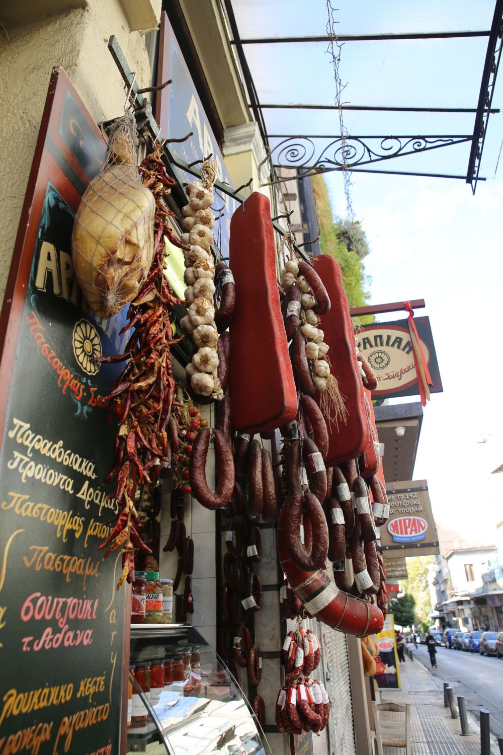 Athens food tour: Traditional food shop with curated meat